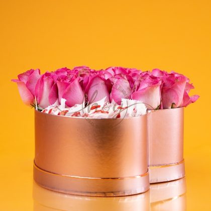 Pink heart  Box with pink roses and  raffellos